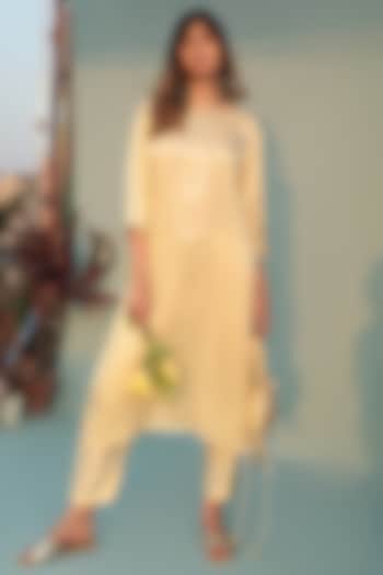 Pastel Yellow Satin Vegan Mirror & Sequins Embroidered Kurta Set by Prahnaaya at Pernia's Pop Up Shop