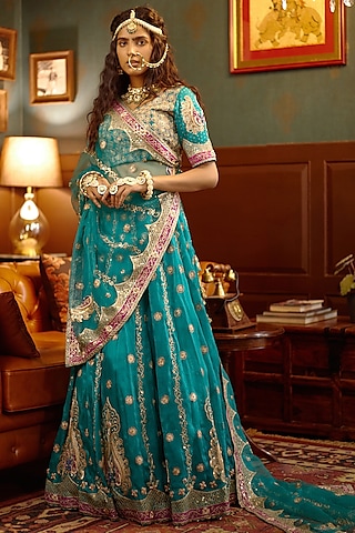 Turquoise Hand Embroidered Lehenga Set by PRATIBHA SULTANIA