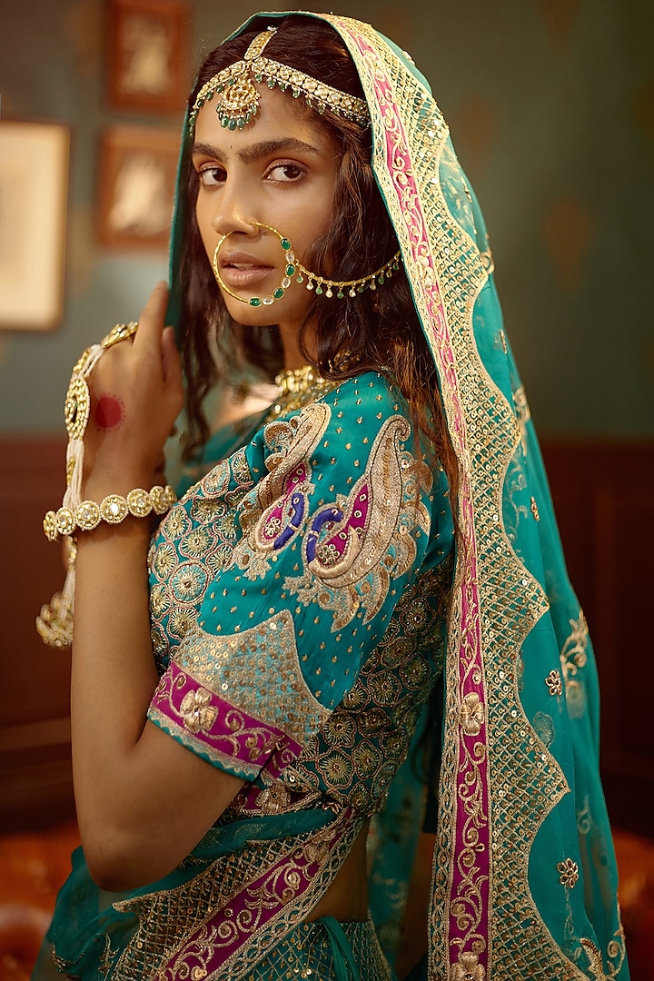 Turquoise Hand Embroidered Bridal Lehenga Set by PRATIBHA SULTANIA at Pernia's Pop Up Shop
