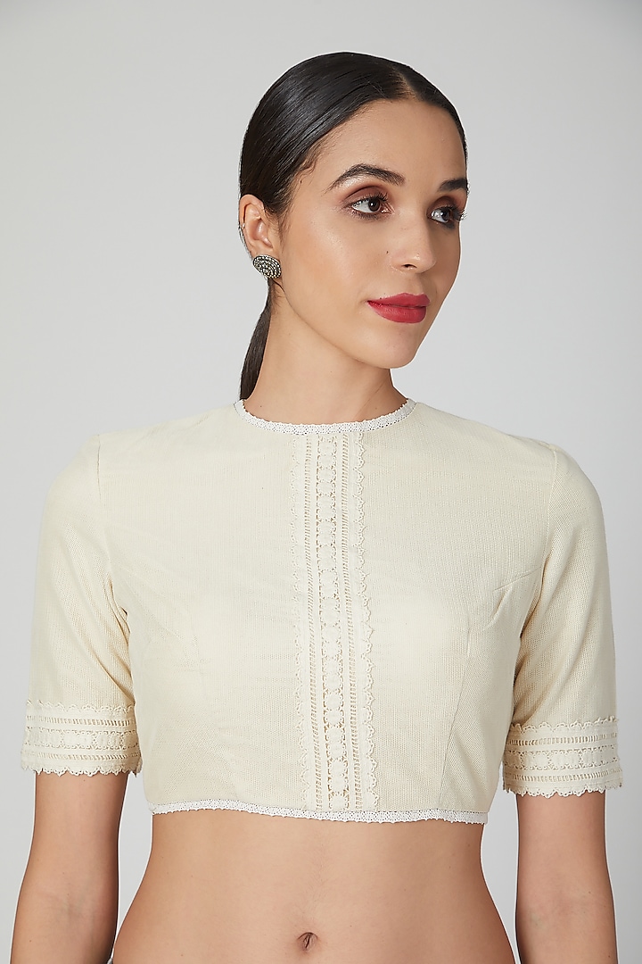 Ivory Crochet Blouse With Lace Border by Pranay Baidya