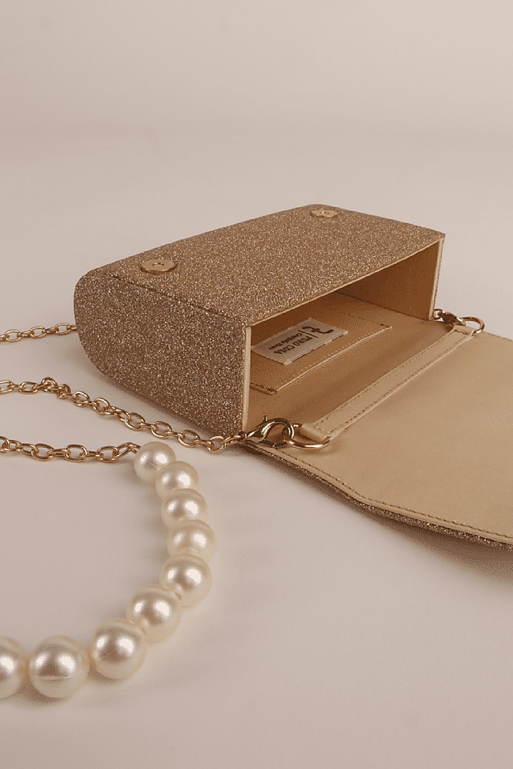 Gold Japanese Satin Clutch by Puro Cosa at Pernia's Pop Up Shop