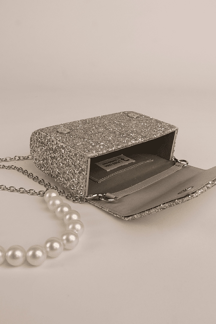 Silver Japanese Satin Clutch by Puro Cosa at Pernia's Pop Up Shop