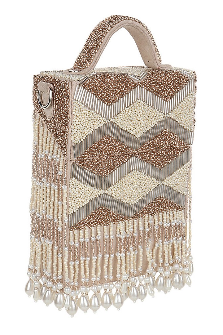 Ivory Embroidered Hand Bag by Puro Cosa at Pernia's Pop Up Shop