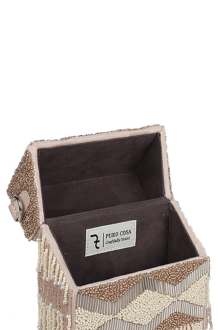 Ivory Embroidered Hand Bag by Puro Cosa at Pernia's Pop Up Shop
