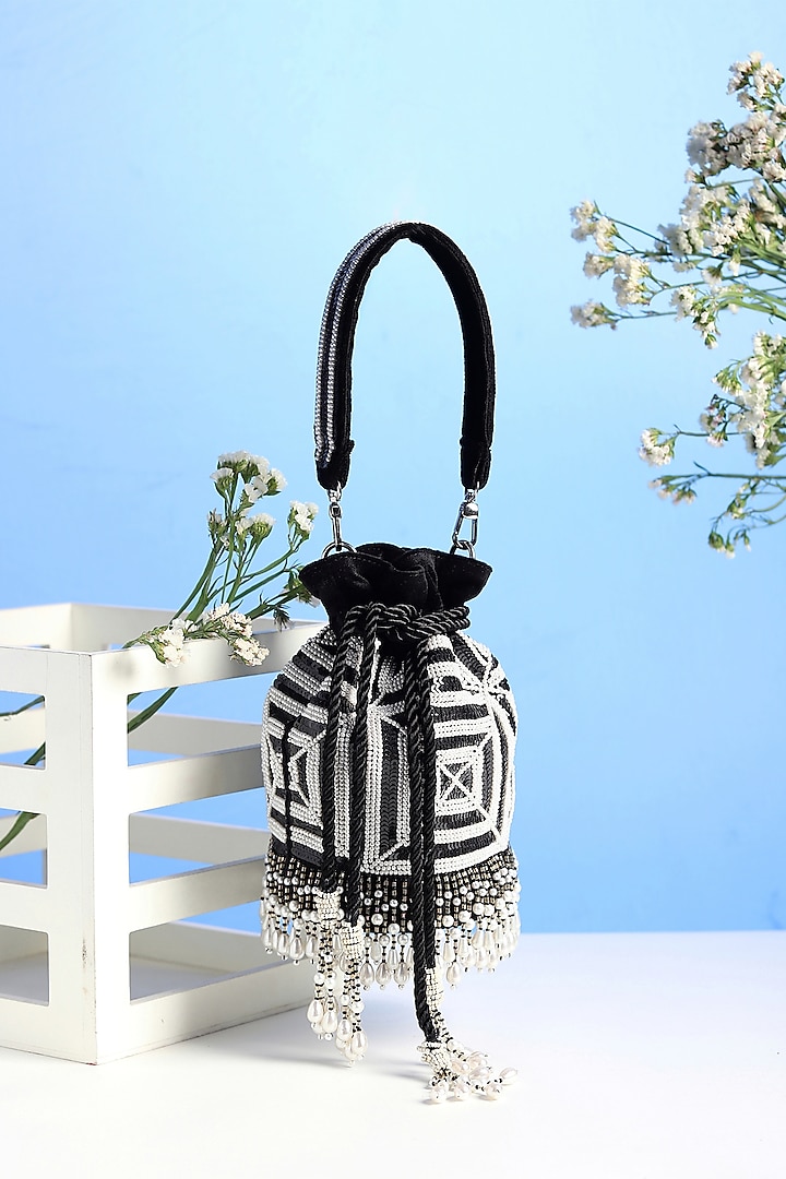 Black Embroidered Potli by Puro Cosa at Pernia's Pop Up Shop