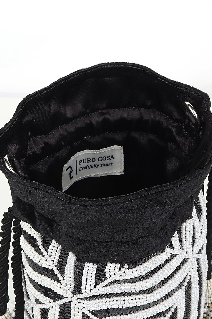 Black Embroidered Potli by Puro Cosa at Pernia's Pop Up Shop