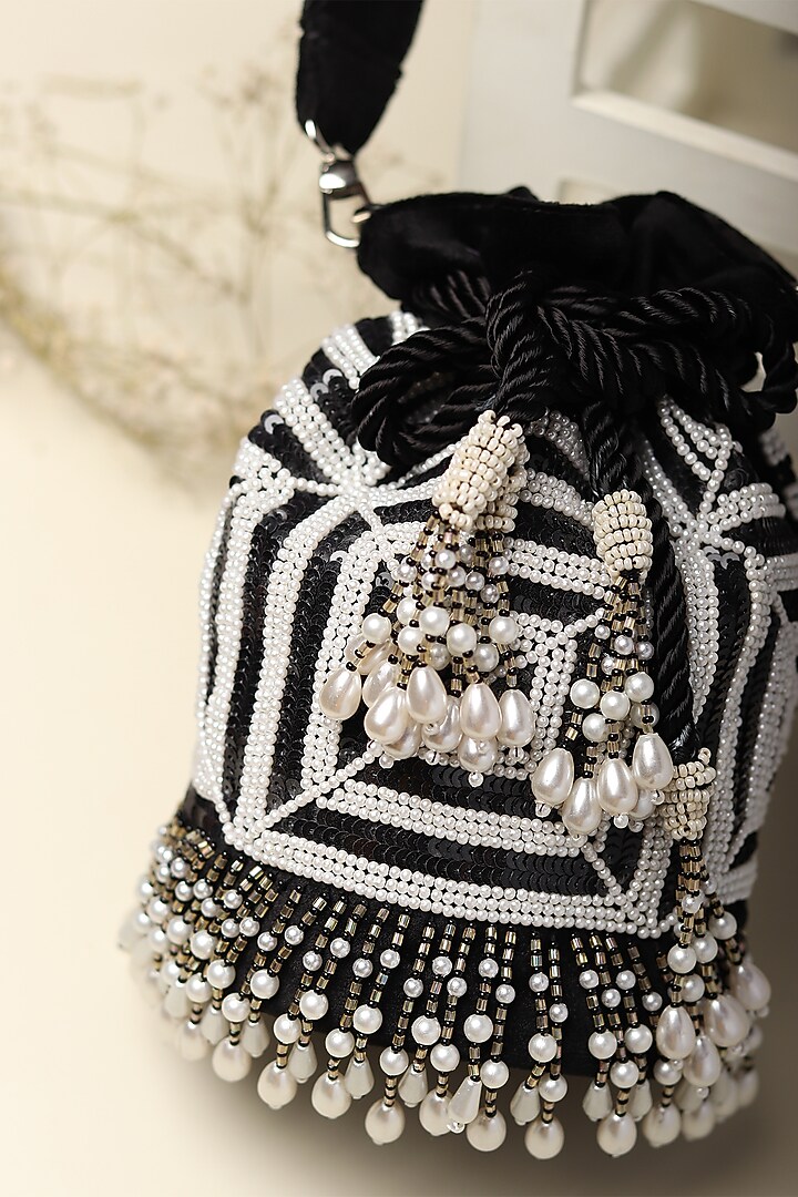 Black Embroidered Potli by Puro Cosa at Pernia's Pop Up Shop