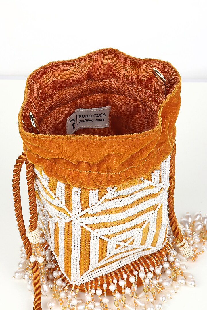 Mustard Embroidered Potli by Puro Cosa at Pernia's Pop Up Shop