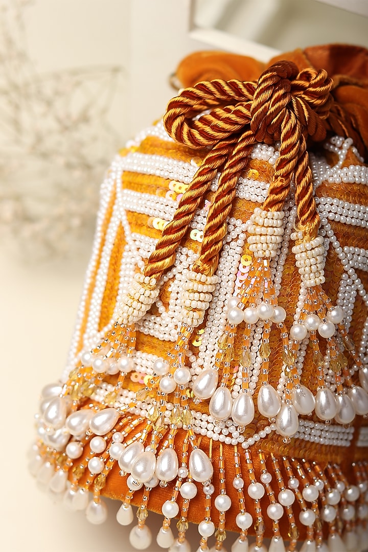 Mustard Embroidered Potli by Puro Cosa at Pernia's Pop Up Shop