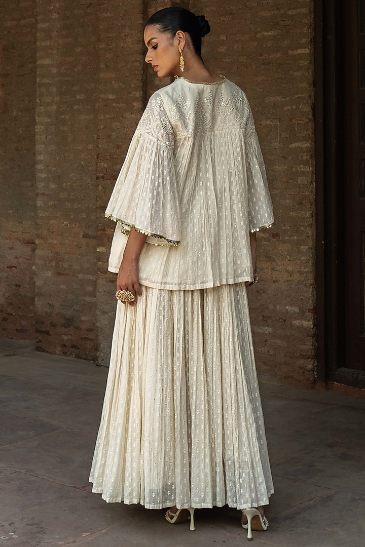 Off-White Cotton Shimmer Mulmul Skirt Set by PREEVIN at Pernia's Pop Up Shop