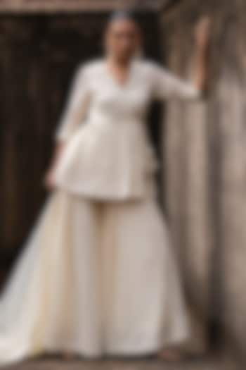 Off-White Shimmer Mulmul Embroidered Party Wear Sharara Set by PREEVIN at Pernia's Pop Up Shop