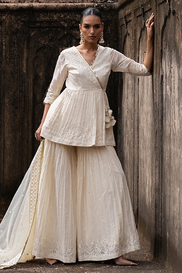 Off-White Shimmer Mulmul Embroidered Party Wear Sharara Set by PREEVIN at Pernia's Pop Up Shop