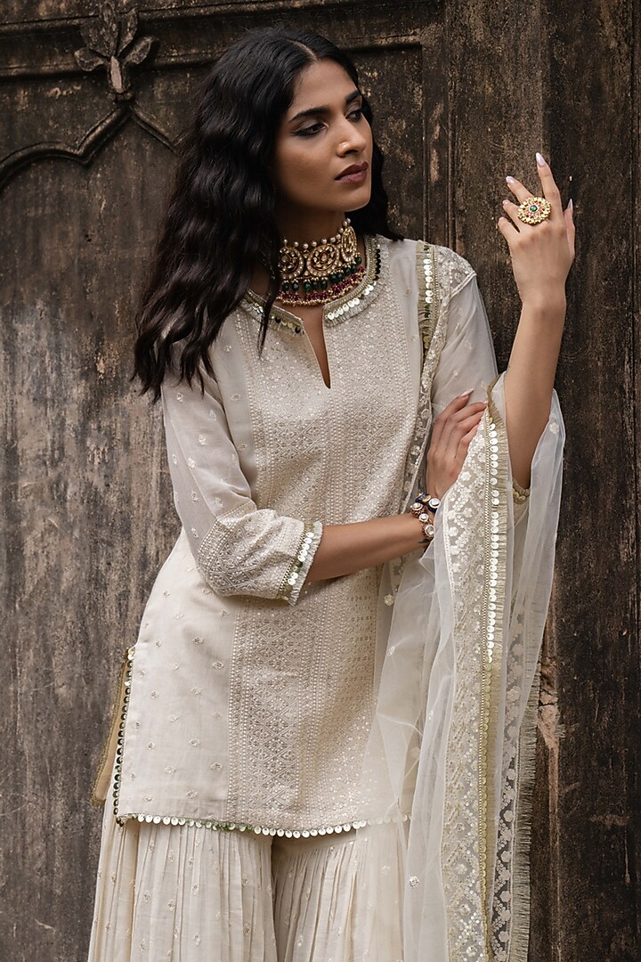 Off-White Cotton Shimmer Mulmul Embroidered Party Wear Sharara Set by PREEVIN at Pernia's Pop Up Shop