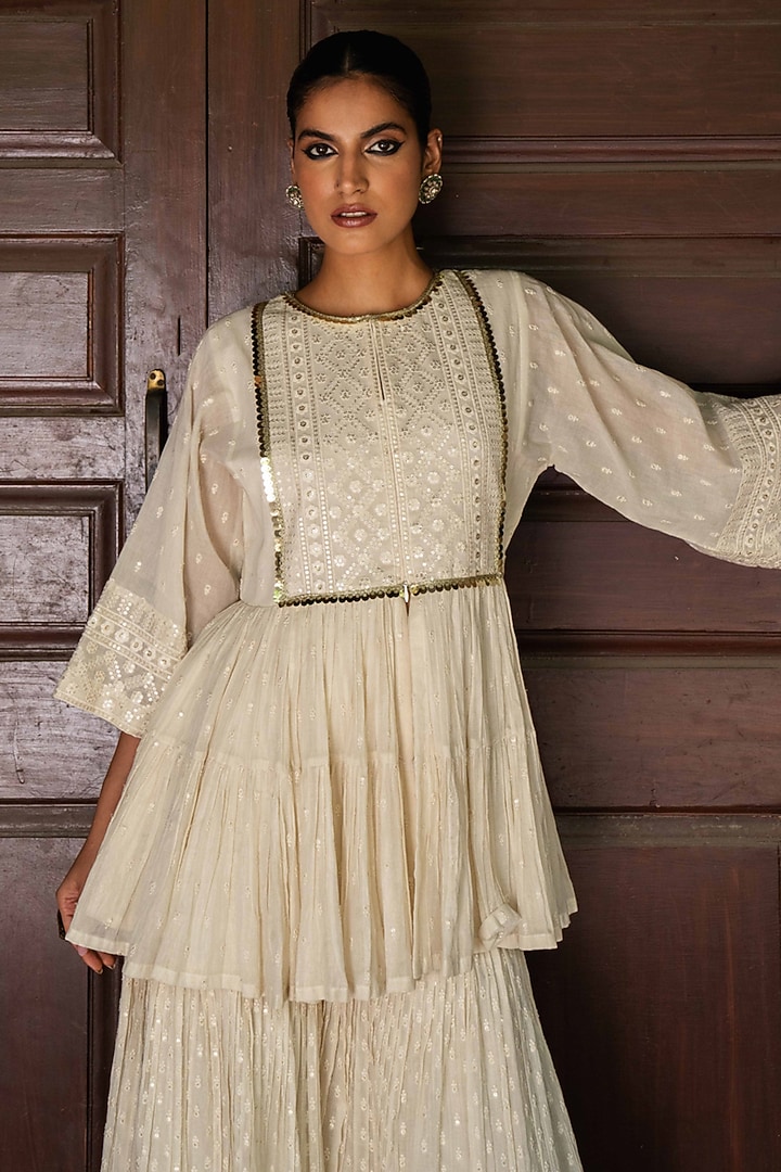 Off-White Cotton Shimmer Mulmul Embroidered Party Wear Sharara Set by PREEVIN at Pernia's Pop Up Shop