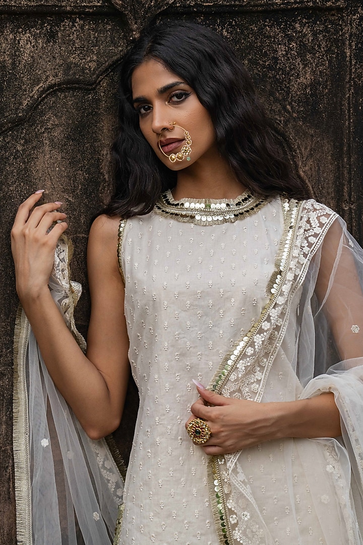 Off-White Cotton Shimmer Mulmul Embroidered Party Wear Sharara Set by PREEVIN at Pernia's Pop Up Shop