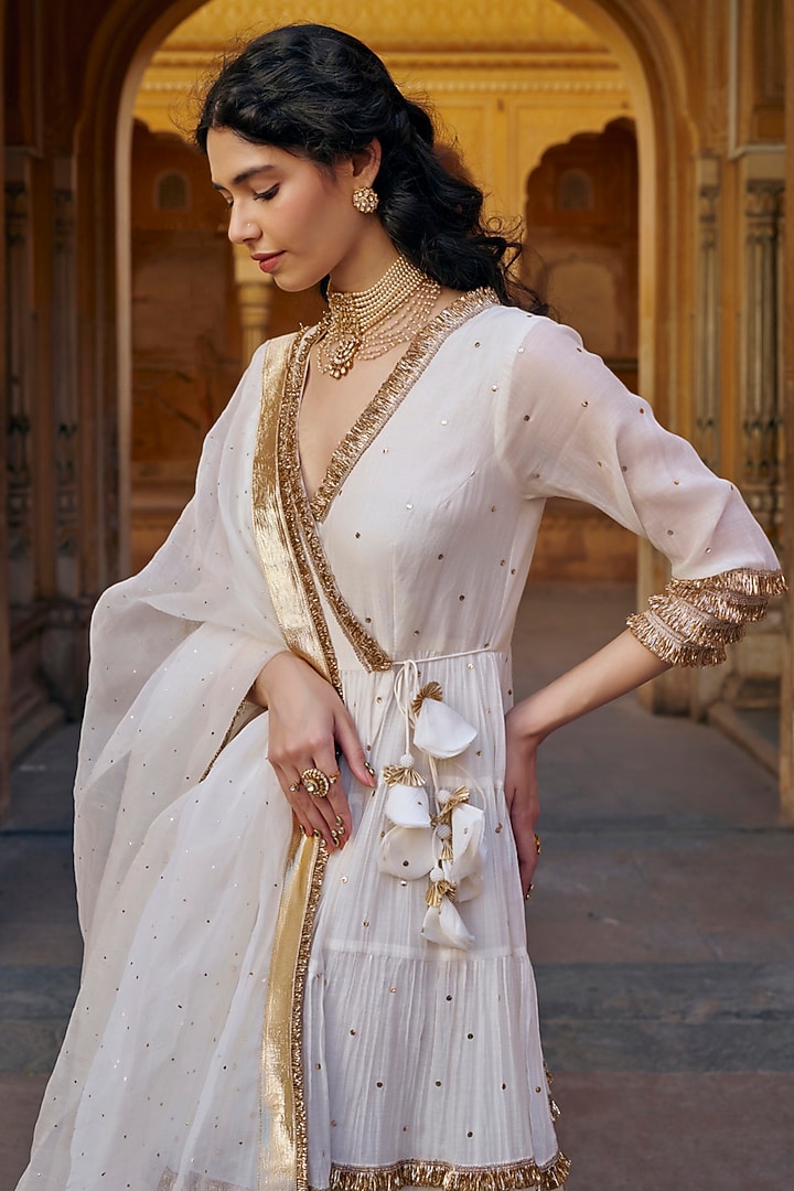 Ivory Chanderi Silk Mukaish Handwork Tiered Angrakha With Dupatta by PREEVIN at Pernia's Pop Up Shop