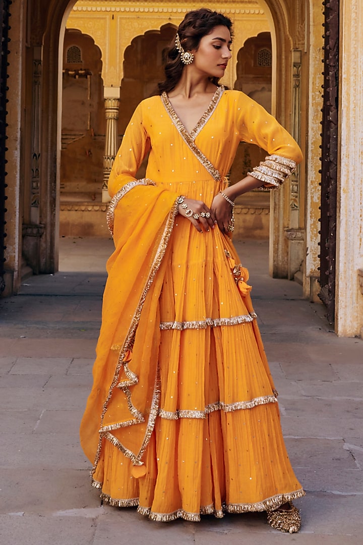 Saffron Chanderi Silk Mukaish Handwork Tiered Angrakha With Dupatta by PREEVIN at Pernia's Pop Up Shop