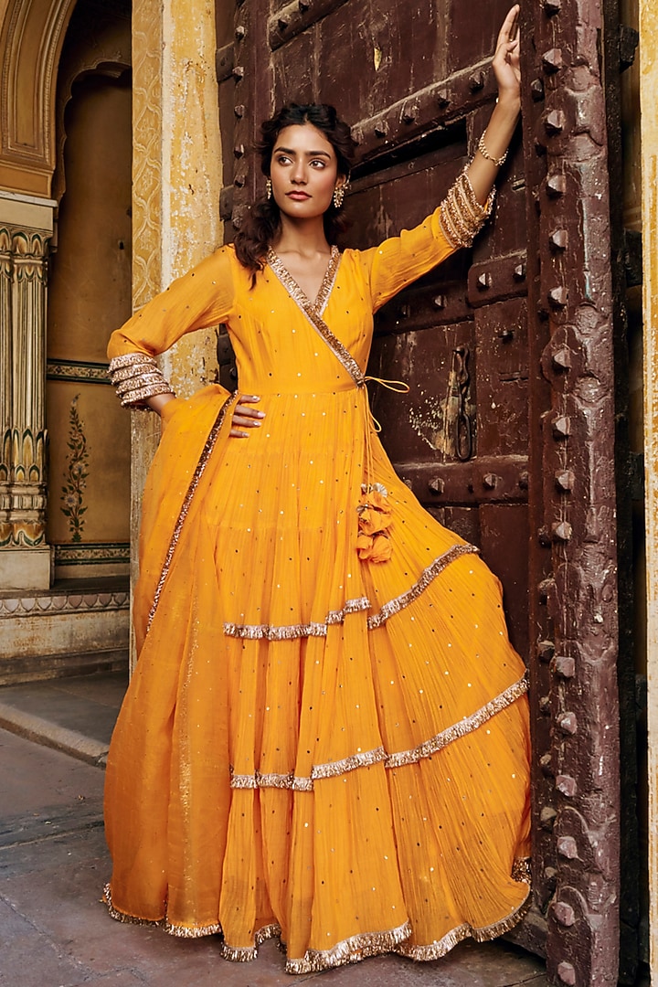 Saffron Chanderi Silk Mukaish Handwork Tiered Angrakha With Dupatta by PREEVIN at Pernia's Pop Up Shop