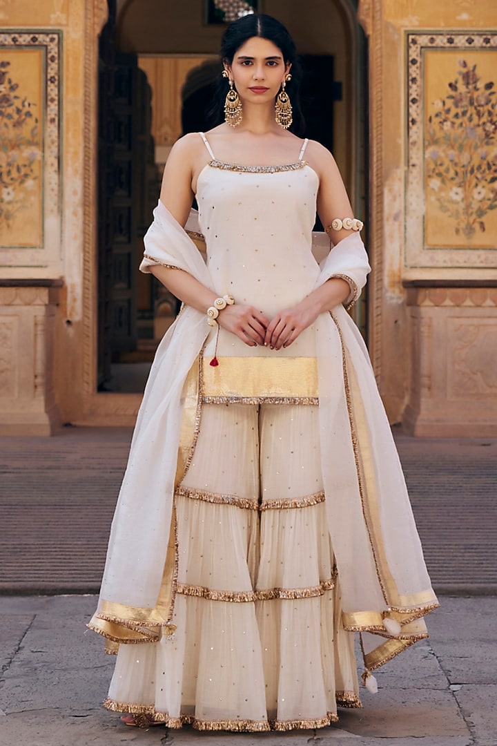 Ivory Chanderi Silk Mukaish Hand Work Party Wear Sharara Set by PREEVIN at Pernia's Pop Up Shop