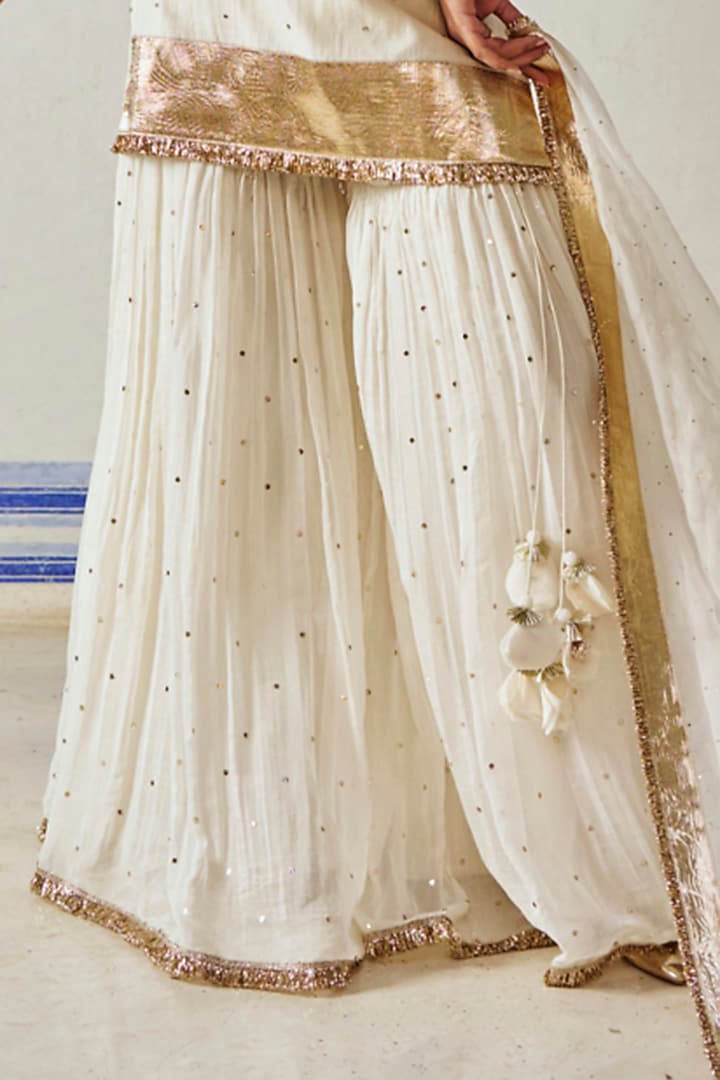 Ivory Chanderi Silk Mukaish Hand Work Party Wear Sharara Set by PREEVIN at Pernia's Pop Up Shop