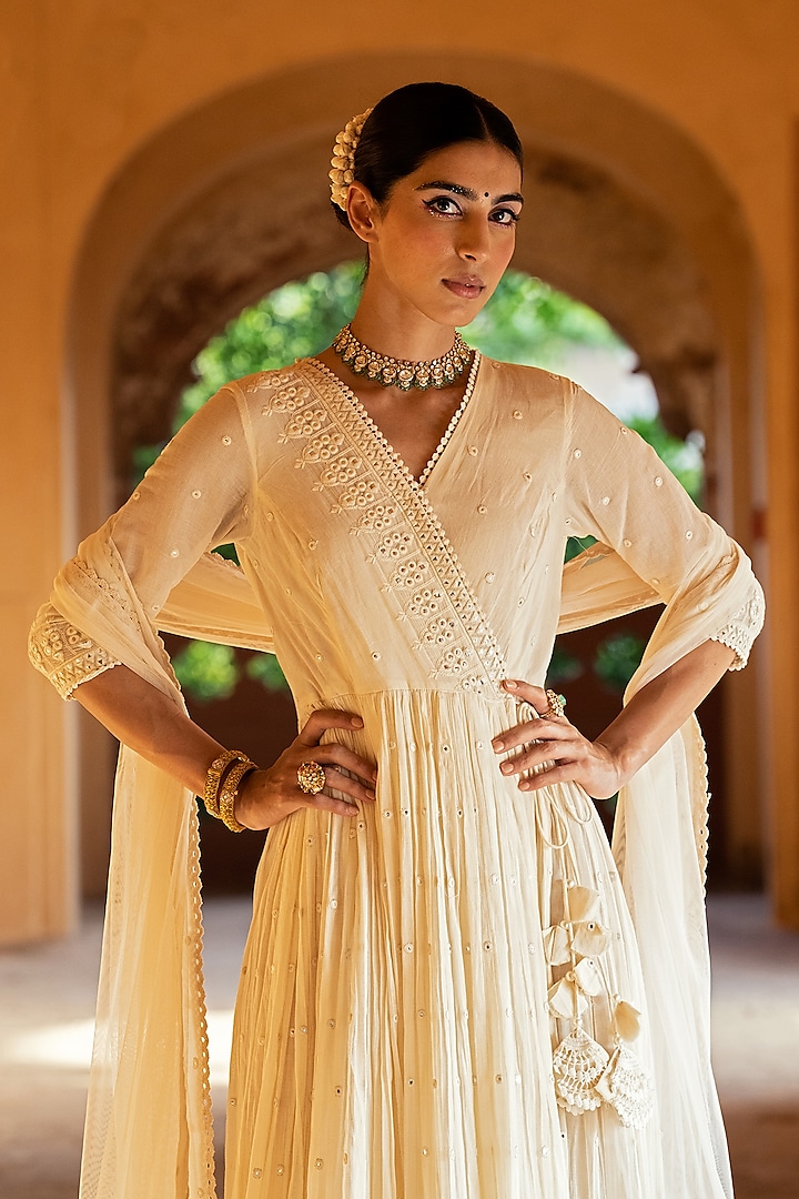 Off-White Cotton Mulmul Thread & Mirror Work Angrakha Anarkali Set by PREEVIN at Pernia's Pop Up Shop