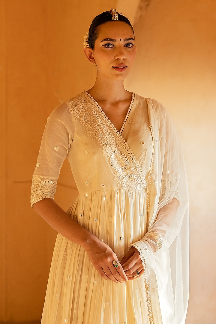 Off-White Cotton Mulmul Thread & Mirror Work Angrakha Anarkali Set by PREEVIN at Pernia's Pop Up Shop
