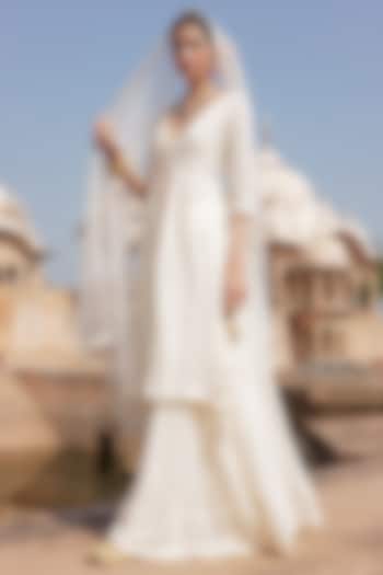 Off-White Cotton Mulmul Thread Embroidered Lehenga Set by PREEVIN at Pernia's Pop Up Shop