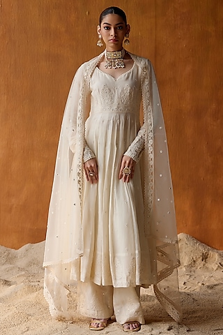 white color anarkali dress Precious Georgette Mirror Work Gown creating a stunning visual contrast Gown White Color Cotton Frock