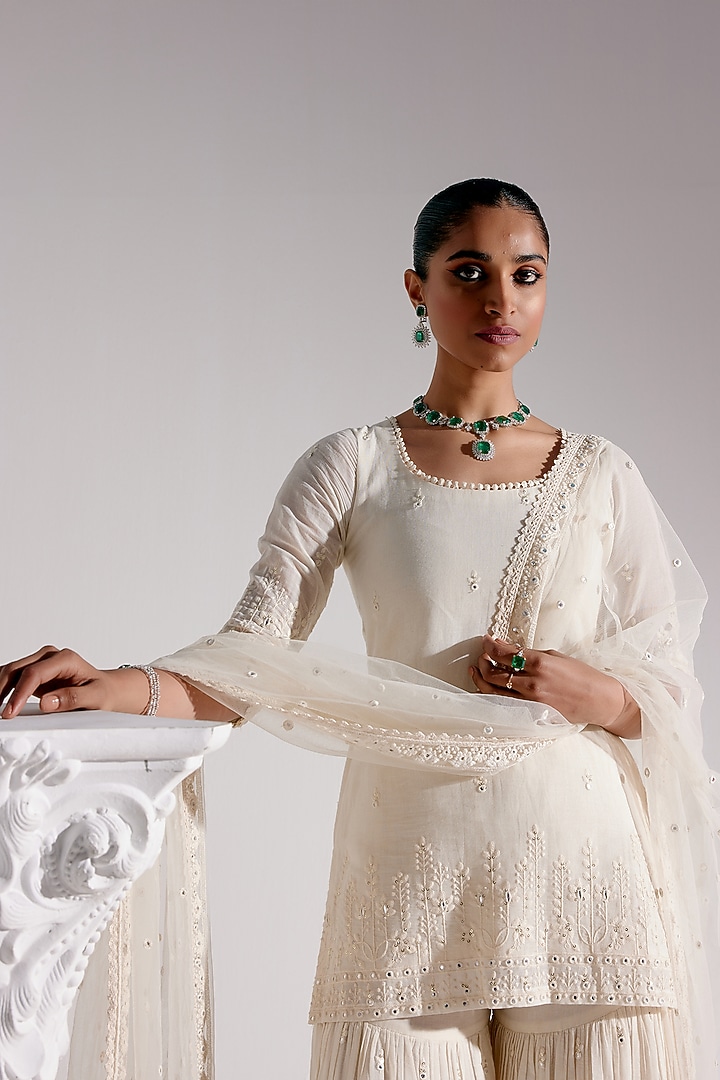 Off-White Cotton Mulmul Thread & MIrror Work Party Wear Sharara Set by PREEVIN at Pernia's Pop Up Shop