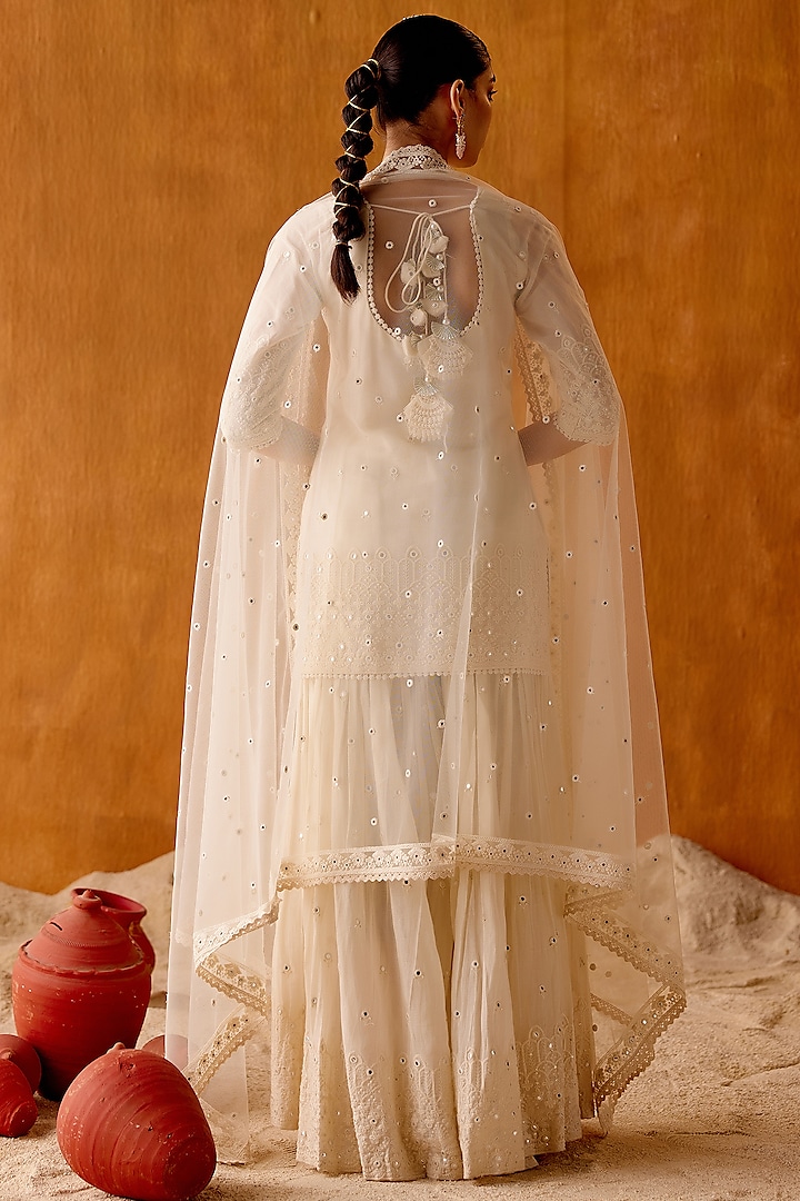 Off-White Cotton Mulmul Thread & Mirror Work Party Wear Sharara Set by PREEVIN at Pernia's Pop Up Shop