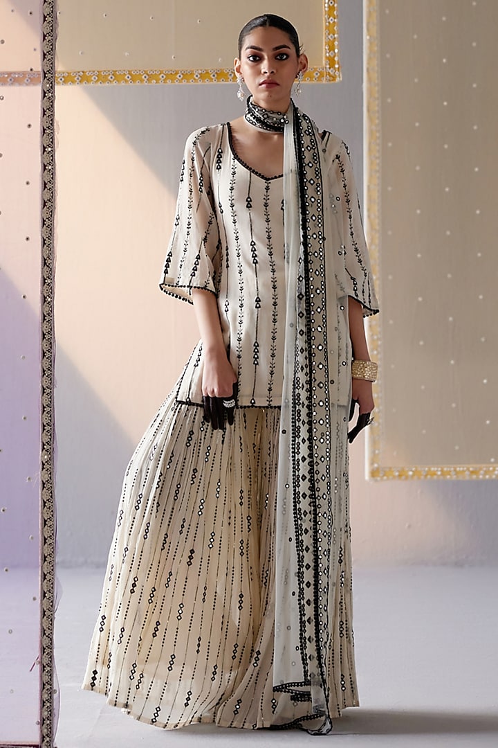 Black & White Cotton Mulmul Thread & Mirror Embroidered Sharara Set by PREEVIN at Pernia's Pop Up Shop