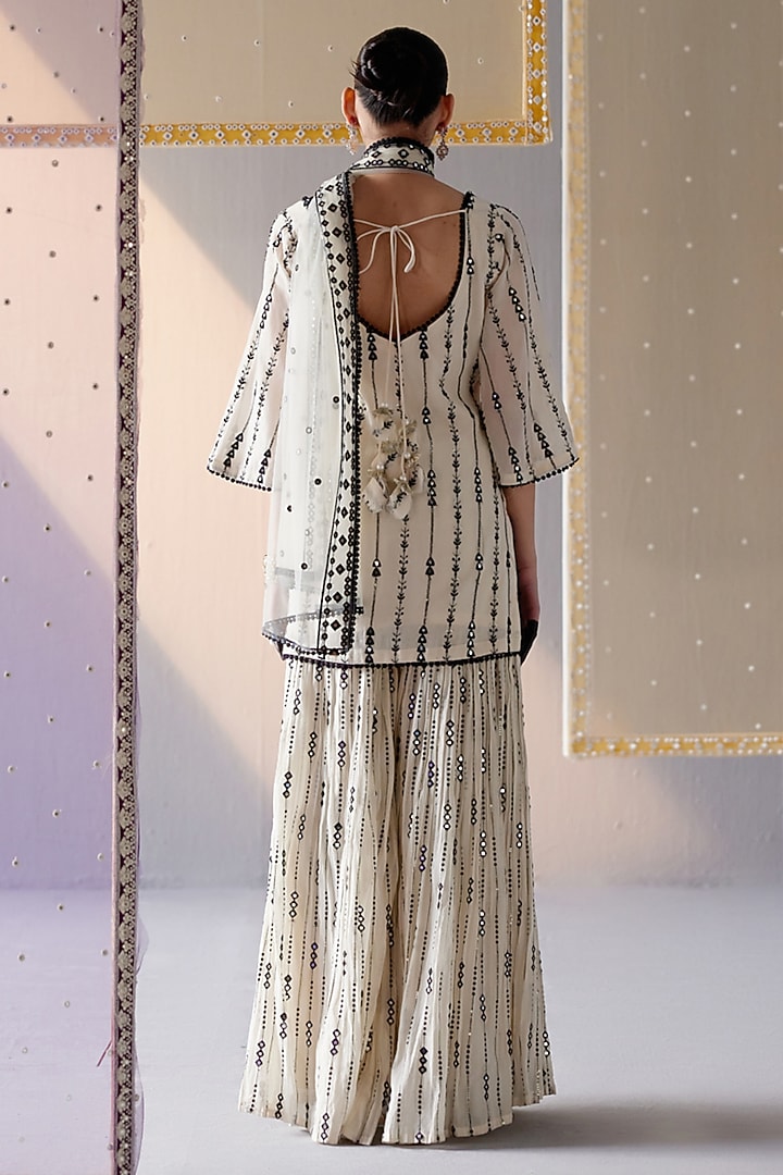 Black & White Cotton Mulmul Thread & Mirror Embroidered Party Wear Sharara Set by PREEVIN at Pernia's Pop Up Shop