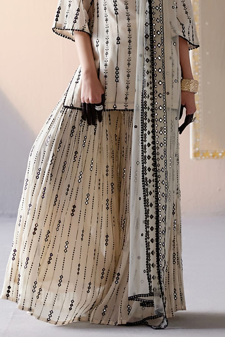 Black & White Cotton Mulmul Thread & Mirror Embroidered Party Wear Sharara Set by PREEVIN at Pernia's Pop Up Shop