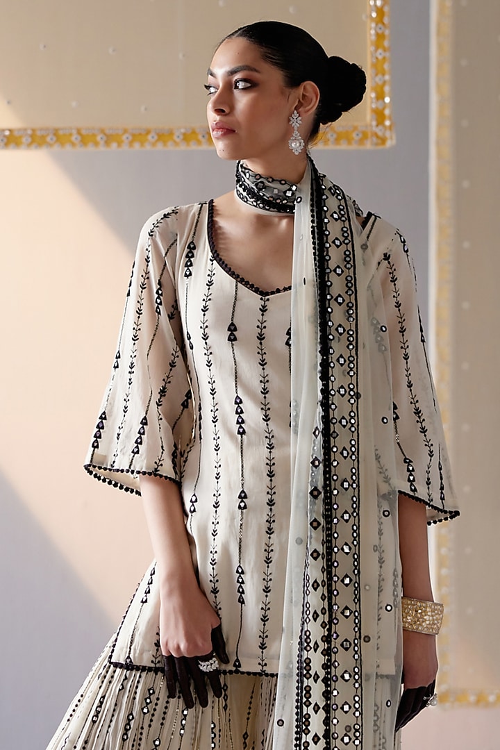 Black & White Cotton Mulmul Thread & Mirror Embroidered Party Wear Sharara Set by PREEVIN at Pernia's Pop Up Shop