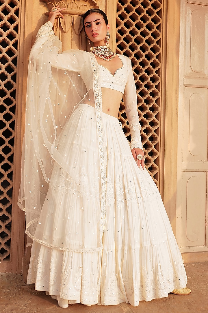 Off-White Cotton Mulmul Mirror & Thread Embroidered Lehenga Set by PREEVIN at Pernia's Pop Up Shop