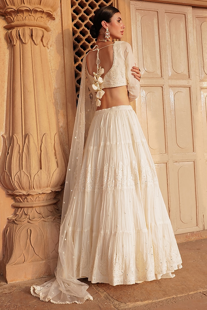 Off-White Cotton Mulmul Mirror & Thread Embroidered Lehenga Set by PREEVIN at Pernia's Pop Up Shop