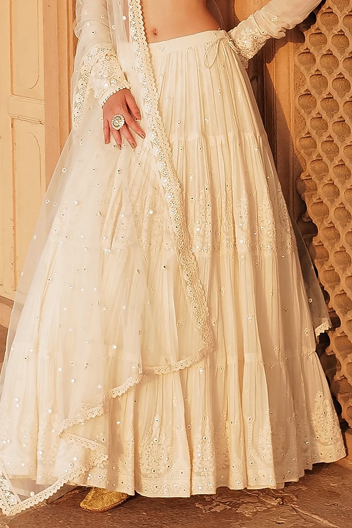 Off-White Cotton Mulmul Mirror & Thread Embroidered Lehenga Set by PREEVIN at Pernia's Pop Up Shop