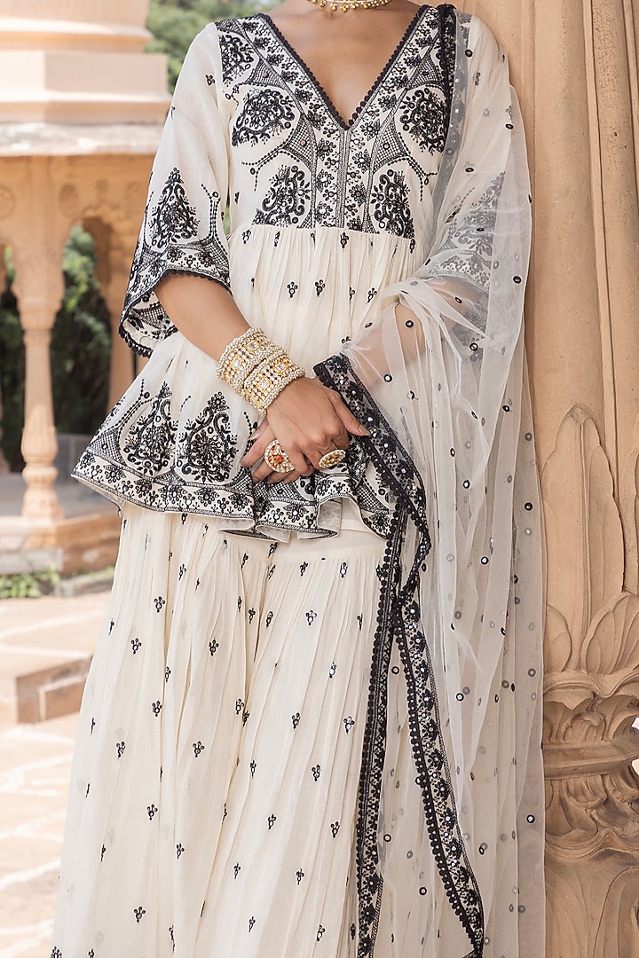 Black & White Cotton Mulmul Thread Embroidered Party Wear Sharara Set by PREEVIN at Pernia's Pop Up Shop