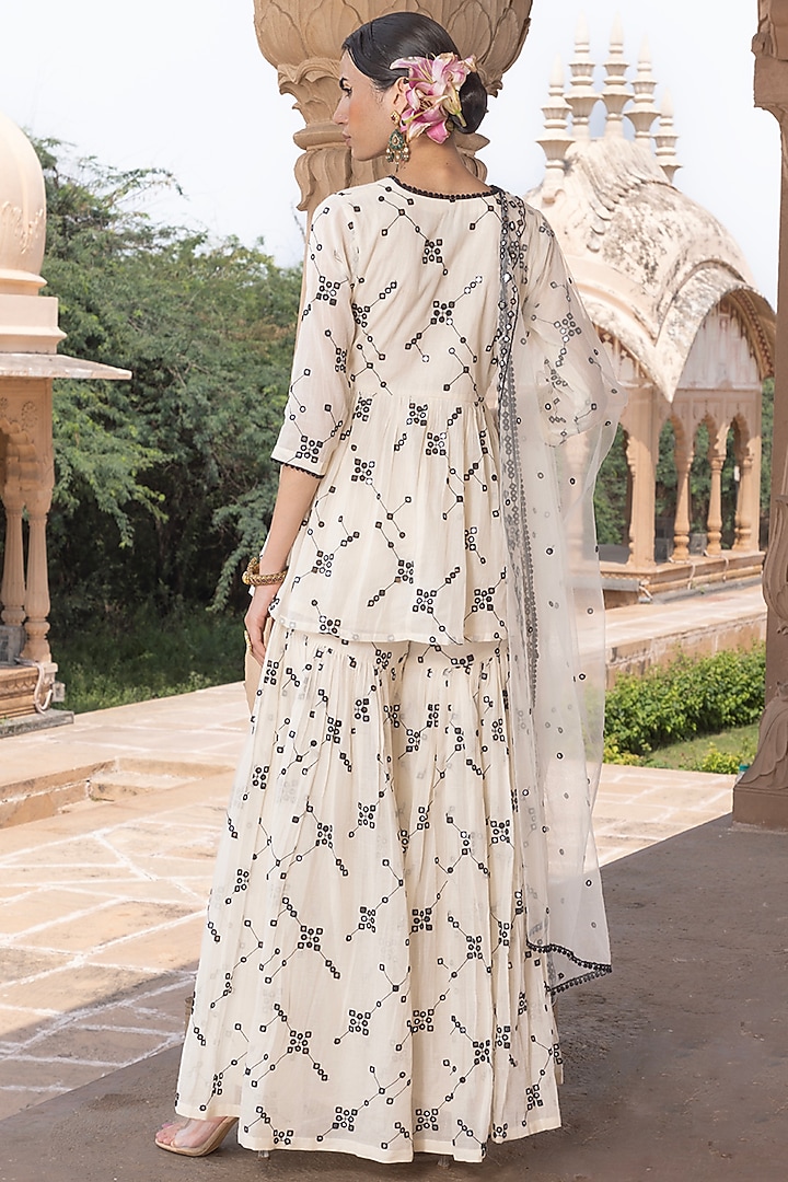 Black & White Cotton Mulmul Thread Embroidered Party Wear Sharara Set by PREEVIN at Pernia's Pop Up Shop