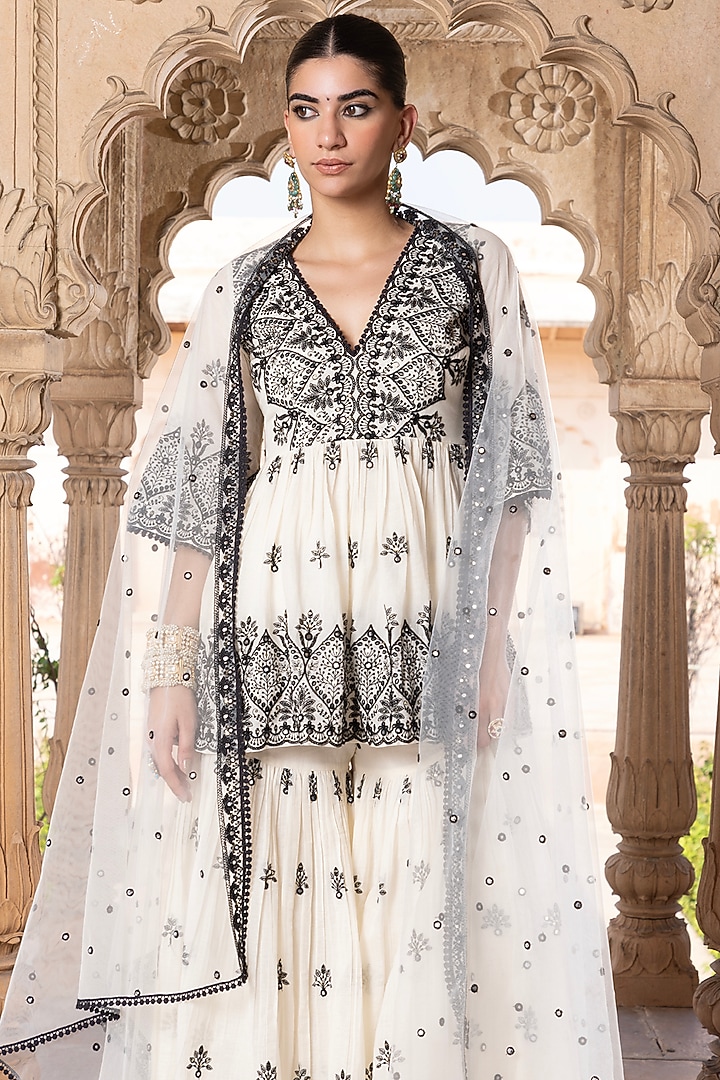 Black & White Cotton Mulmul Thread Embroidered Party Wear Sharara Set by PREEVIN at Pernia's Pop Up Shop