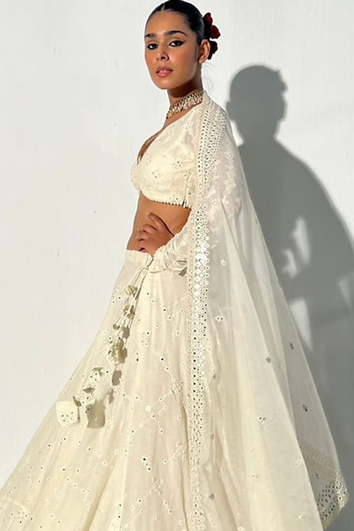 Off-White Cotton Mulmul Thread & Mirror Work Wedding Lehenga Set by PREEVIN at Pernia's Pop Up Shop