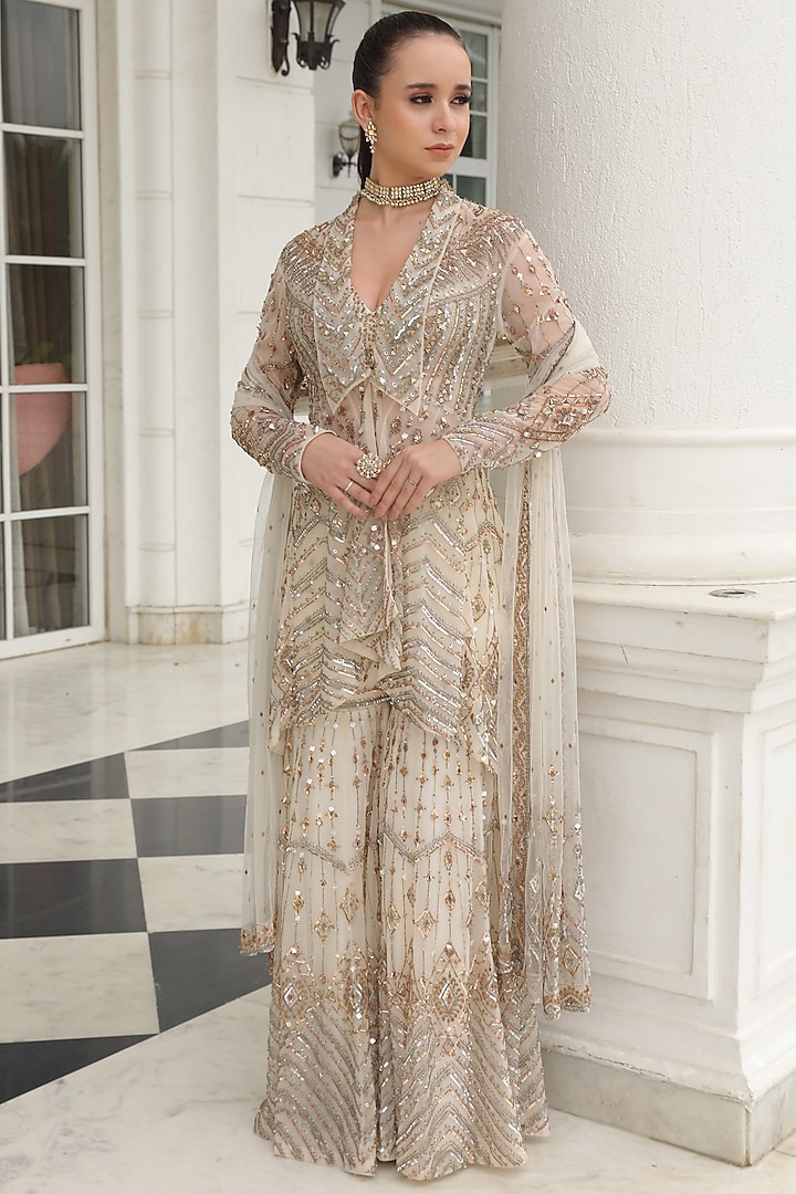 Ivory Net Embroidered Flared Sharara Set by PRESTO COUTURE