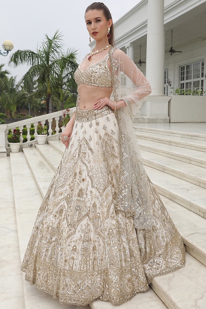 Ivory Net Crystal Hand Embroidered Lehenga Set by PRESTO COUTURE