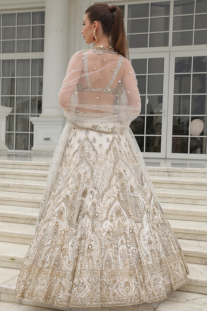 Ivory Net Crystal Hand Embroidered Bridal Lehenga Set by PRESTO COUTURE at Pernia's Pop Up Shop