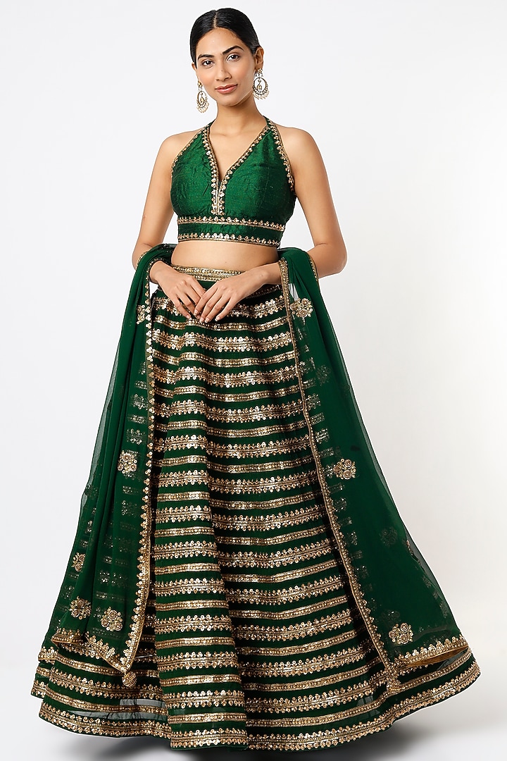 Bottle Green Hand Embroidered Wedding Lehenga Set by Prevasu at Pernia's Pop Up Shop