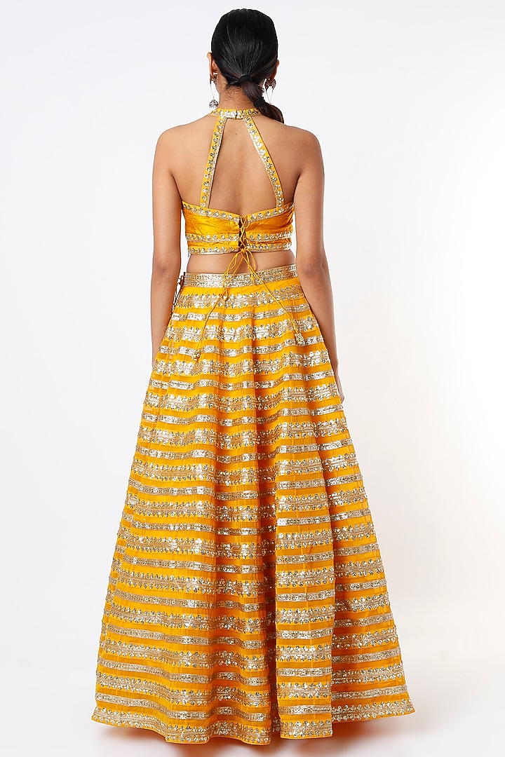 Mustard Embroidered Wedding Lehenga Set by Prevasu at Pernia's Pop Up Shop