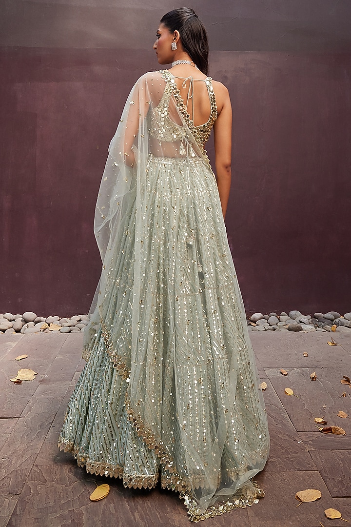 Green Georgette Sequins Embroidered Paneled Bridal Lehenga Set by Prevasu at Pernia's Pop Up Shop