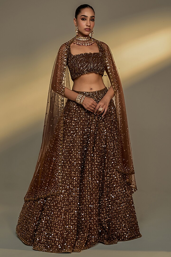 Copper Gold Net Sequins Embroidered Bridal Lehenga Set by Prevasu at Pernia's Pop Up Shop
