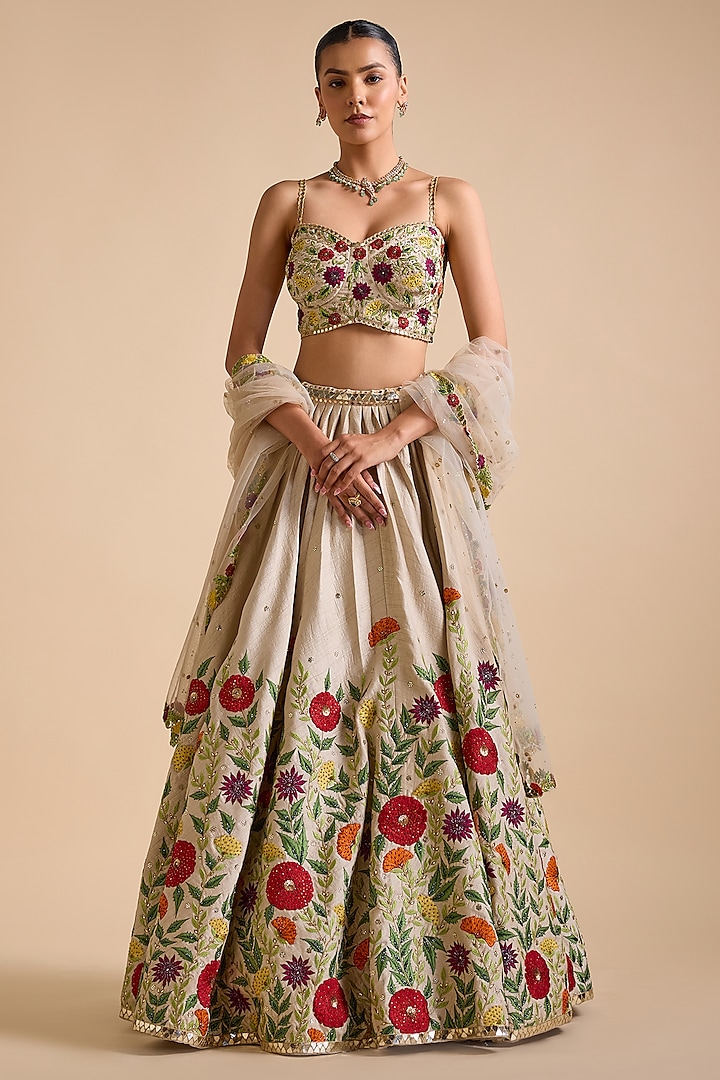 Ivory Silk Thread & Sequins Embroidered Bridal Lehenga Set by Prevasu at Pernia's Pop Up Shop