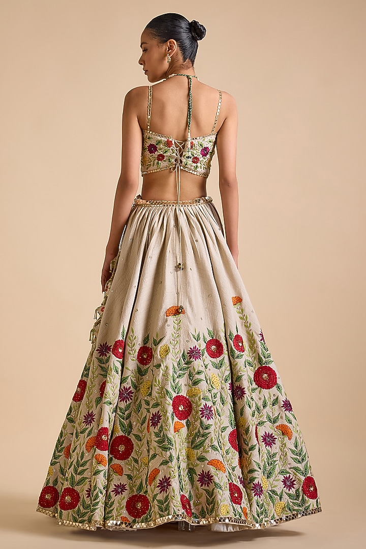 Ivory Silk Thread & Sequins Embroidered Bridal Lehenga Set by Prevasu at Pernia's Pop Up Shop